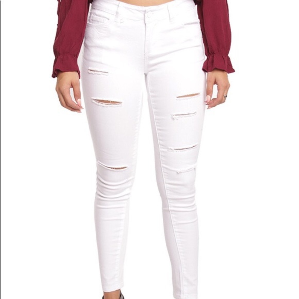 White ripped jeans